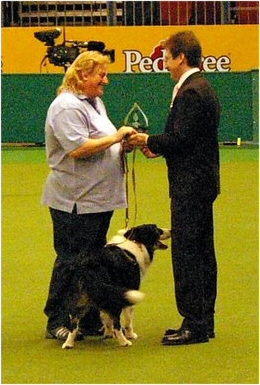 Tracy Day accepting trophy from Judge Keith Brooks