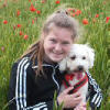Jody and Ralphie enjoying cuddles in a beautiful poppy field.